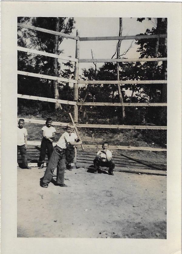 historic photo of boys playing baseball