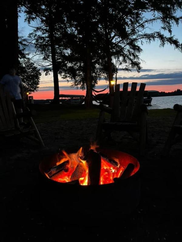a campfire near the shore