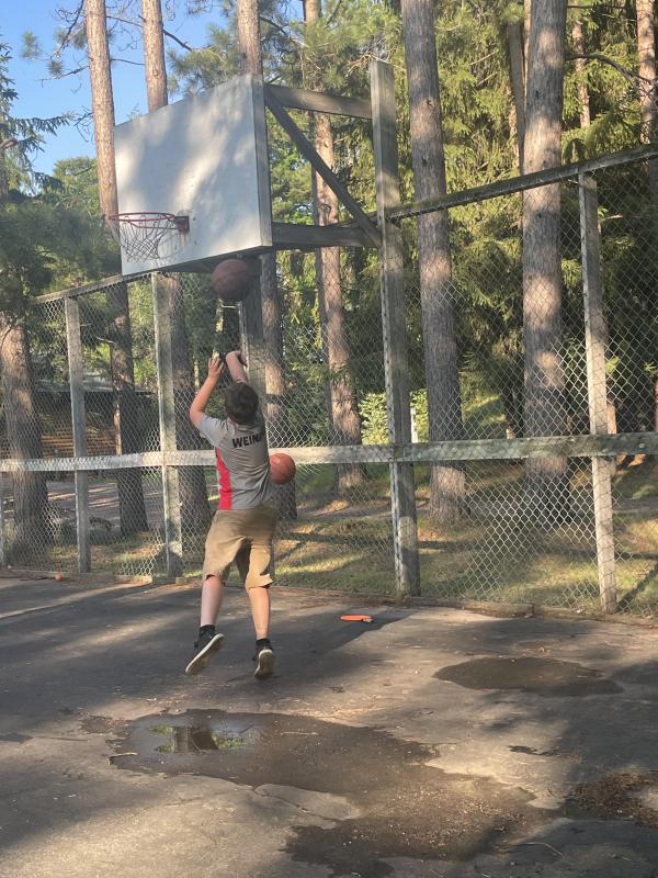 shooting hoops on the basketball court